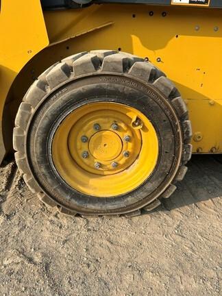 318G SKID STEER LOADER BASE - Cab w/ AC, EH Joystick Controls, Air Ride Seat; 2 Speed; Self-Leveling; Beefy Baby Tires; General Purpose Bkt