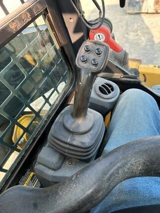 318G SKID STEER LOADER BASE - Cab w/ AC, EH Joystick Controls, Air Ride Seat; 2 Speed; Self-Leveling; Beefy Baby Tires; General Purpose Bkt