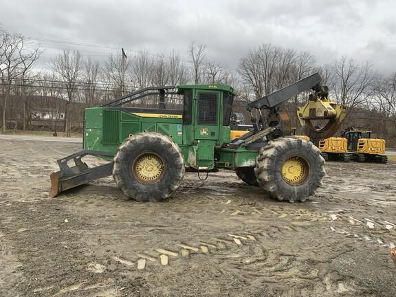 848L GRAPPLE SKIDDER - Cab w/ AC, Lever Steer; Dual Funct Grapple; Stacking Blade; 35.5 Tires