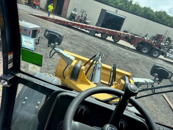 304 G FOUR WHL DRIVE LOADER - Cab w/ AC; General Purpose Bkt; 405/70R20 Tires; Options: Ride Control