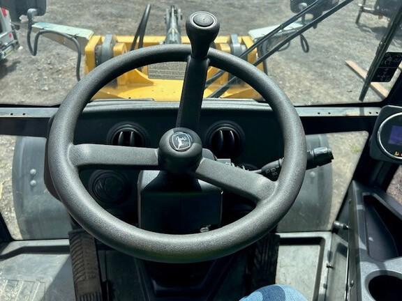304 G FOUR WHL DRIVE LOADER - Cab w/ AC; General Purpose Bkt; 405/70R20 Tires; Options: Ride Control