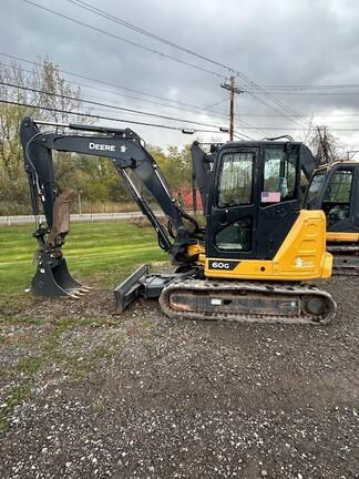 60G COMPACT EXCAVATOR - Cab w/ AC, Cntrl Pattern Select; Rubber Tracks; 24" Bucket; Aux Hydraulics, Coupler, Hydraulic Thumb; Angle Blade