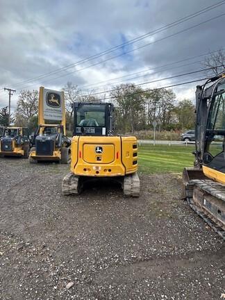60G COMPACT EXCAVATOR - Cab w/ AC, Cntrl Pattern Select; Rubber Tracks; 24" Bucket; Aux Hydraulics, Coupler, Hydraulic Thumb; Angle Blade