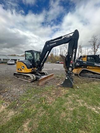 60G COMPACT EXCAVATOR - Cab w/ AC, Cntrl Pattern Select; Rubber Tracks; 24" Bucket; Aux Hydraulics, Coupler, Hydraulic Thumb; Angle Blade
