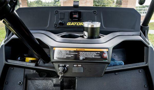 Dash storage compartments, cup holders, and USB power ports