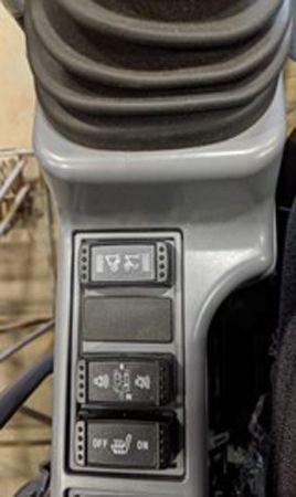 Coupler control switch on left side pilot tower
