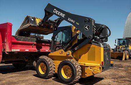 324 G-Tier loading a truck