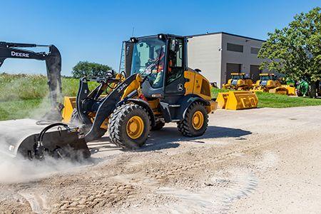 BR84C Pick-up Broom featured on a 324L Wheel Loader