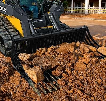 R75 sifting through rock and dirt